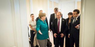 Ангела Меркел, Владимир Путин и Емануел Макрон на срещата на Г20 в Хамбург. Снимка: German Government/Kugler