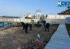 Почистване на тревата на плажа в парк "Росенец"