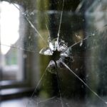 Дупка от куршум в стъкло