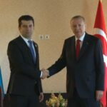(от ляво надясно) Кирил Петков и Реджеп Тайип Ердоган