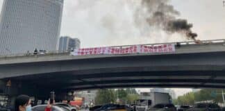 Протест в Китай - лозунги.