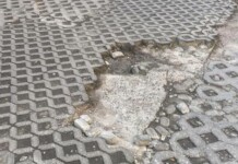 Дупките на общинския паркинг