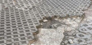Дупките на общинския паркинг