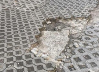 Дупките на общинския паркинг
